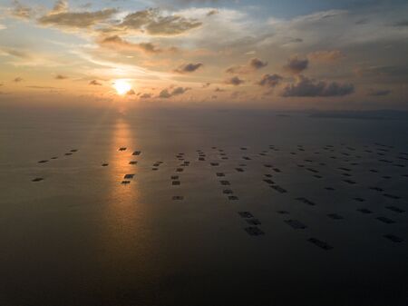 Aerial sunset at fish farm.の写真素材