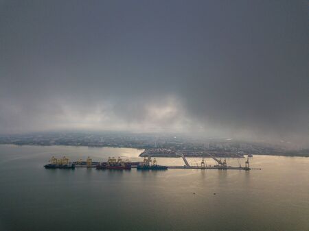 Aerial view North Butterworth Container Terminal (NBCT) over cloud in early morning.の写真素材