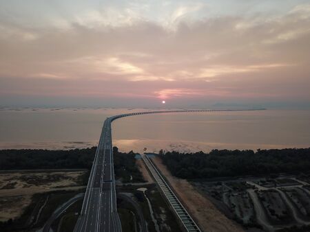Sun down at Penang Bridge view from Batu Kawan.の写真素材