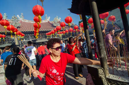 Georgetown, Penang/Malaysia - Jan 25 2020: People pray at Goddess of Mercy temple in first day of...