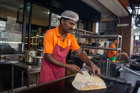 Georgetown, Penang/Malaysia - Feb 14 2020: Indian delicious bread in making.のeditorial素材