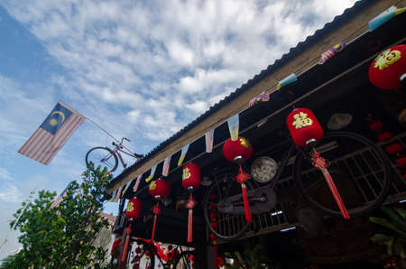 Georgetown, Penang/Malaysia - Feb 14 2020: Malaysia flag decorated at bicycle at rooftop.