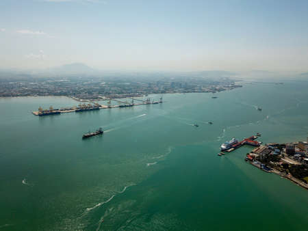 Georgetown, Penang/Malaysia - Feb 28 2020: Cargo ship leave North Butterworth Container Terminal.のeditorial素材