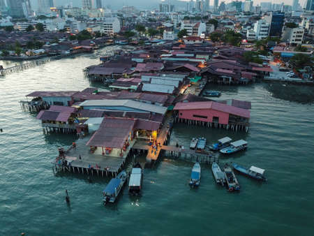 Georgetown, Penang/Malaysia - Feb 28 2020: Chew Jetty with tourist during dusk hour.のeditorial素材