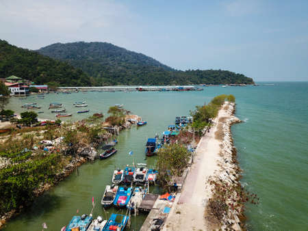 Teluk Bahang, Penang/Malaysia - Mar 08 2020: Boat park at the coastal near Teluk Bahang.のeditorial素材