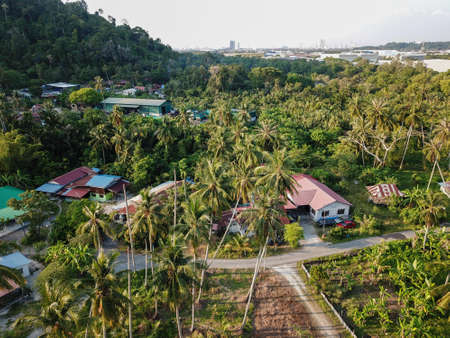 Bukit Mertajam, Penang/Malaysia - Mar 13 2020: Traditional Malays house at rural village.のeditorial素材