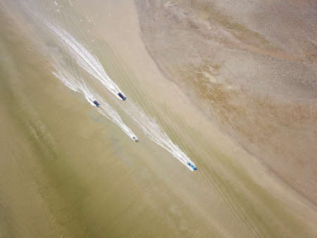 Penaga, Penang/Malaysia - Mar 14 2020: Top down view fishing boat sail at the estuary.のeditorial素材