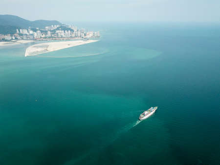 Georgetown, Penang/Malaysia - Mar 17 2020: Cruise sea move near reclamation land at Gurney Wharf.のeditorial素材