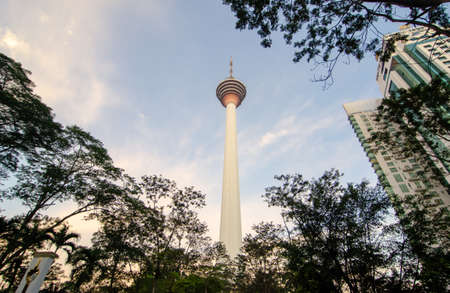 KL, Kuala Lumpur/Malaysia - Jan 15 2019: View of skyline Kuala Lumpur over the green tree in morning.のeditorial素材