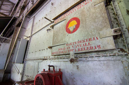 Tanjung Tualang, Perak/Malaysia - Oct 07 2019: Safety sign wear safety helmet in tin Dredge No. 5のeditorial素材