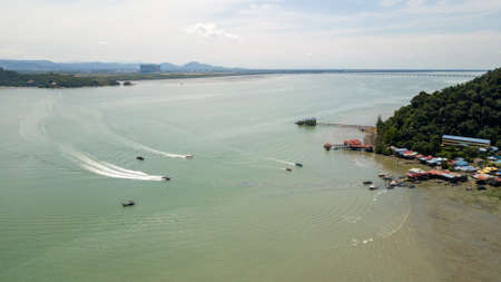 Pulau Aman, Penang/Malaysia - Oct 19 2019: Fishing boat move at sea near Pulau Aman.のeditorial素材