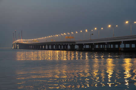 Penang second bridge in dawn hour. Center column is light up during National day.