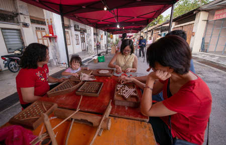 Nibong Tebal, Penang/Malaysia - Feb 01 2019: Play of traditional game at stall.