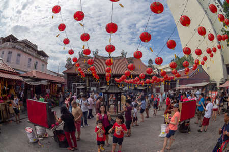 Georgetown, Penang/Malaysia - Jan 30 2017: Chinese devotees pray at temple during chinese new year.のeditorial素材
