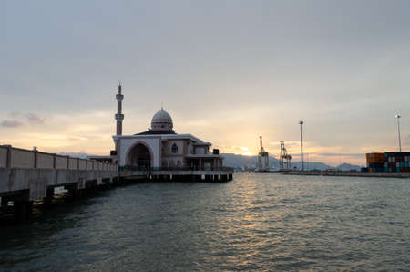 Butterworth, Penang/Malaysia - May 20 2017: Sunset over Penang Floating Mosque in late evening.のeditorial素材