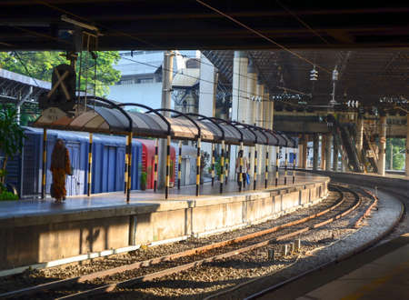 City, Kuala Lumpur/Malaysia - May 24 2014: People walk beside railway at the KL Station.