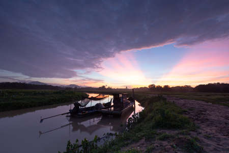 Seberang Perai, Penang/Malaysia - Jun 10 2015: Dawn hour of fisherman boat park at the Sungai Junjung.のeditorial素材