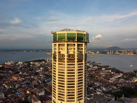 George Town, Penang, Malaysia - Jun 07 2022: Aerial view sun light evening at Komtar building and heritage George Town building at backのeditorial素材