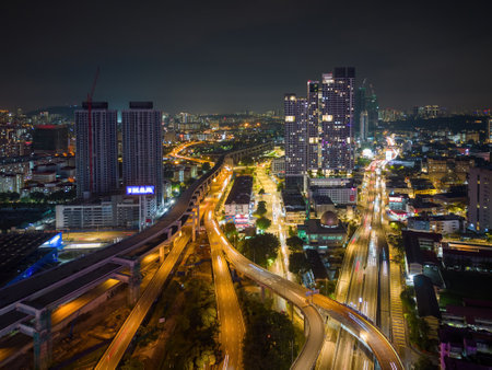 Bukit Bintang, Kuala Lumpur, Malaysia - Nov 28 2022: The city's roads and highways are brightly lit...