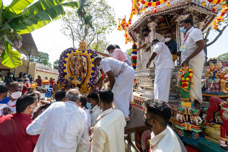 George Town, Penang, Malaysia - Jan 17 2022: Hindu volunteer move the Murugan statue from the silver chariotのeditorial素材