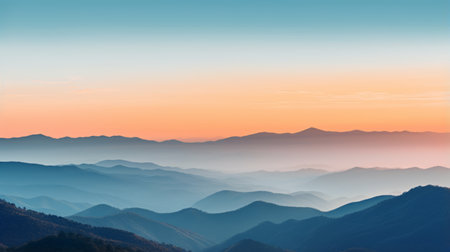 Tranquil mountain range with the sun's last rays casting a glowの素材
