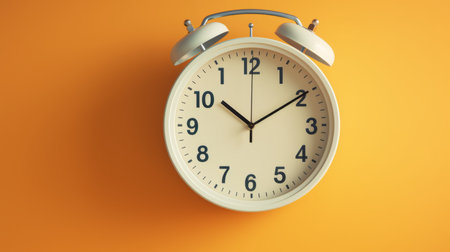 A classroom clock ticking away the minutesの素材