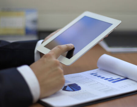 Businessman hands with touchpad の写真素材