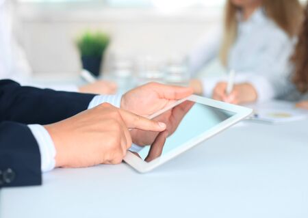 Business adviser analyzing financial figures denoting the progress in the work of the companyの写真素材
