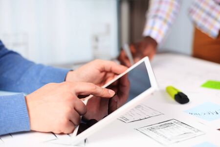 Business adviser analyzing financial figures denoting the progress in the work of the company