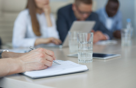 Image of business people hands working with papers at meeting
