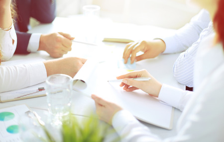 Image of business people hands working with papers at meetingの写真素材