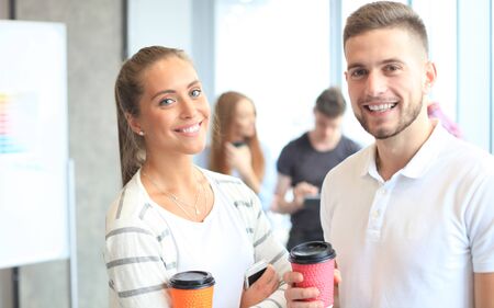 Modern young fashion designers working at studioの写真素材