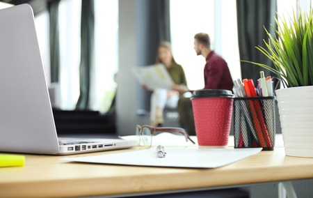 Team young professionals having casual discussion in office. Executives having friendly discussion during break.の写真素材