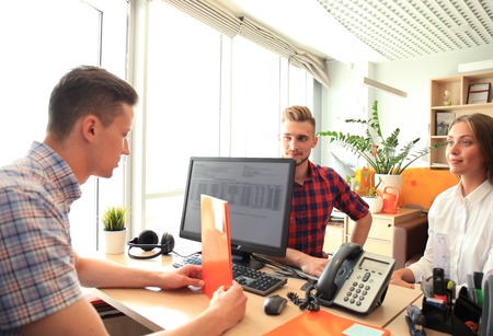 Portrait of happy family reach agreement with real estate agent.の写真素材