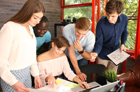 Group of young business people and designers.They working on new project.Startup concept.の写真素材