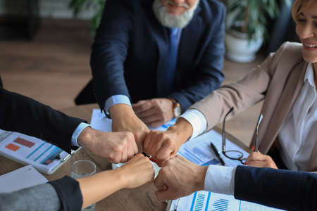 Business people teamwork stacking hand together conceptの写真素材