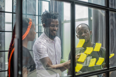 African business team on briefing, discussing ideas for new startup or project.の写真素材