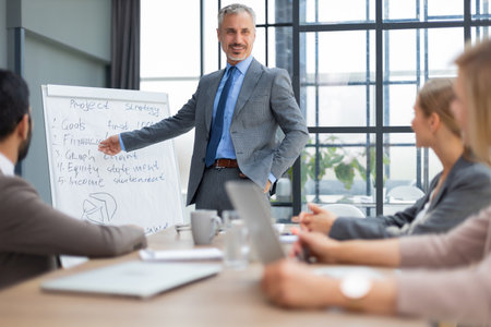 Business conference presentation with team training flipchart officeの写真素材