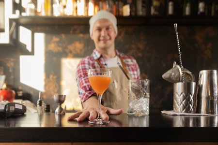 Barman at work, preparing cocktails. concept about service and beveragesの写真素材