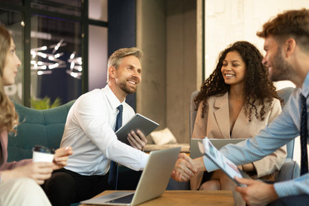 Businessmen shaking hands during a meeting