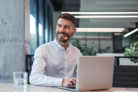 Male customer support operator with headset and smiling