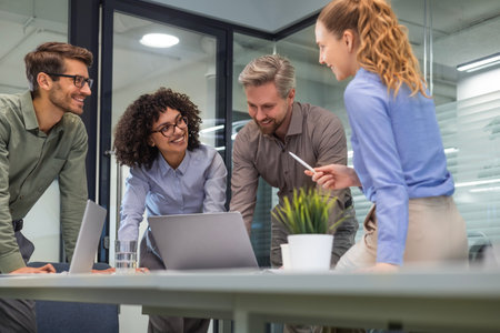 Business team discussing together business plans in office