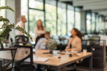 Blurred modern office interior space with employees backgroundの写真素材