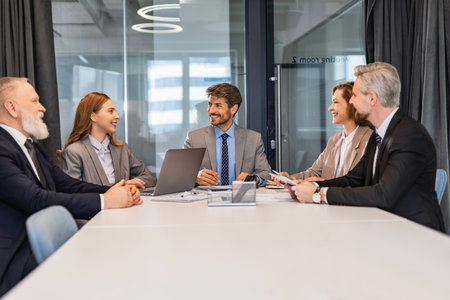 Professional executive businesspeople discuss corporation project planning sit at meeting room,...