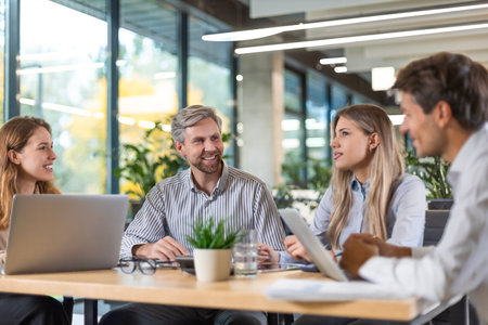Group of happy progressive business people working on startup together at creative office.の写真素材