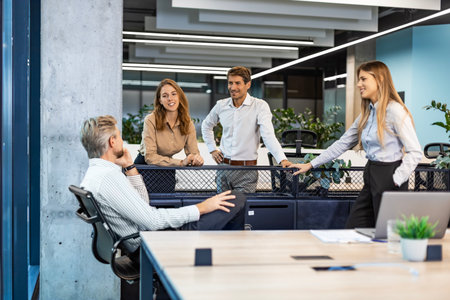 Group of happy progressive business people working on startup together at creative office.の写真素材