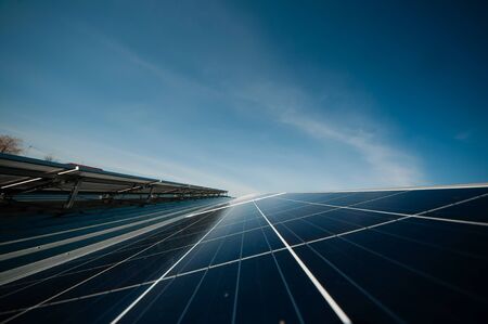 Solar panel against blue sky. Blue solar panels.の写真素材
