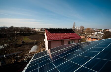 Solar panel against blue sky. Blue solar panels.
