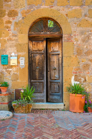 Doors detail from the medieval town Sovana, Tuscany,Italyの写真素材