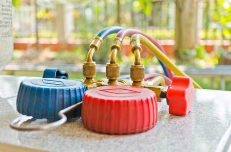 old guaue aircondition blue and redの写真素材